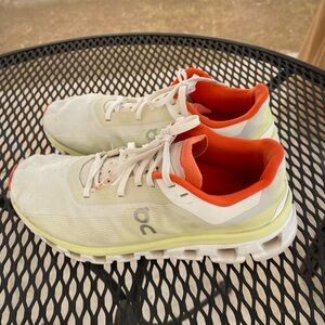 On Cloud Women's Running Sneakers in White with Orange Lining